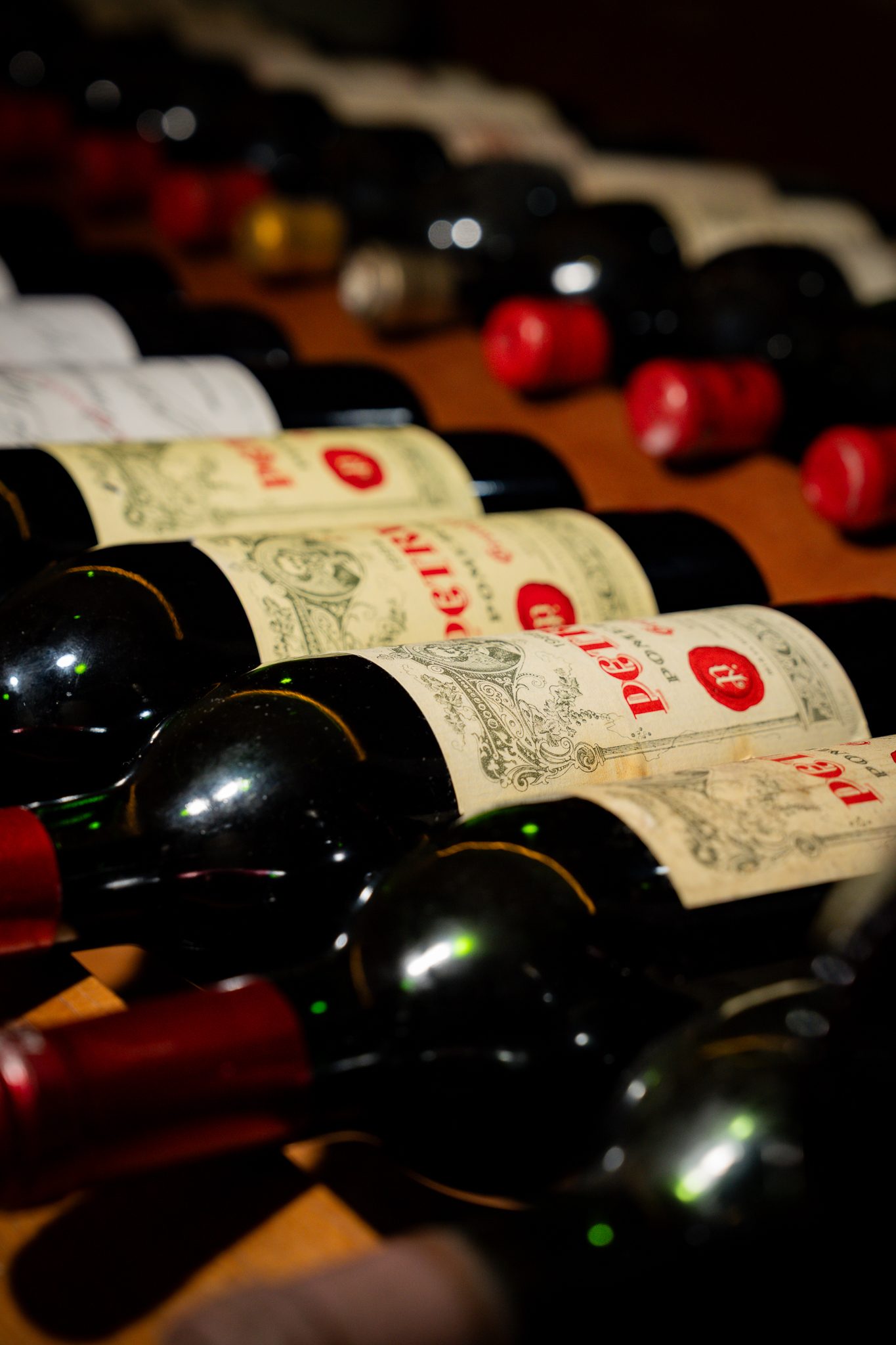 Bottles of Petrus lying in the cellar